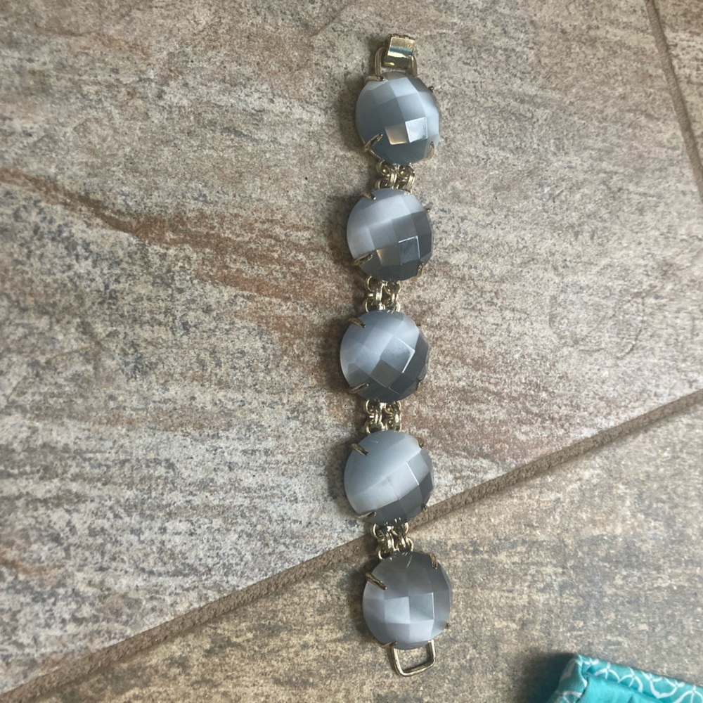 Kendra Scott Cassie bracelet in grey with gold tone GUC prongs not perfect